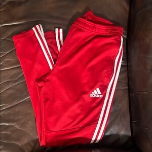 Red Athletic Track Pants with White Side Stripes